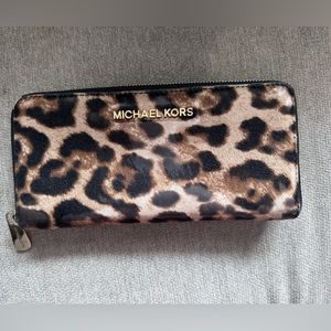 Michael Kors Cheetah Print Zippy Wallet with gold hardware